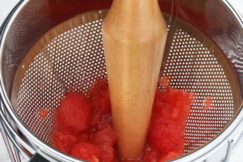 New Star Foodservice 42566 assist-handle strainer for steady pouring.