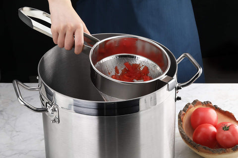 New Star Foodservice 42566 press-through-mesh with pestle for smooth mash.