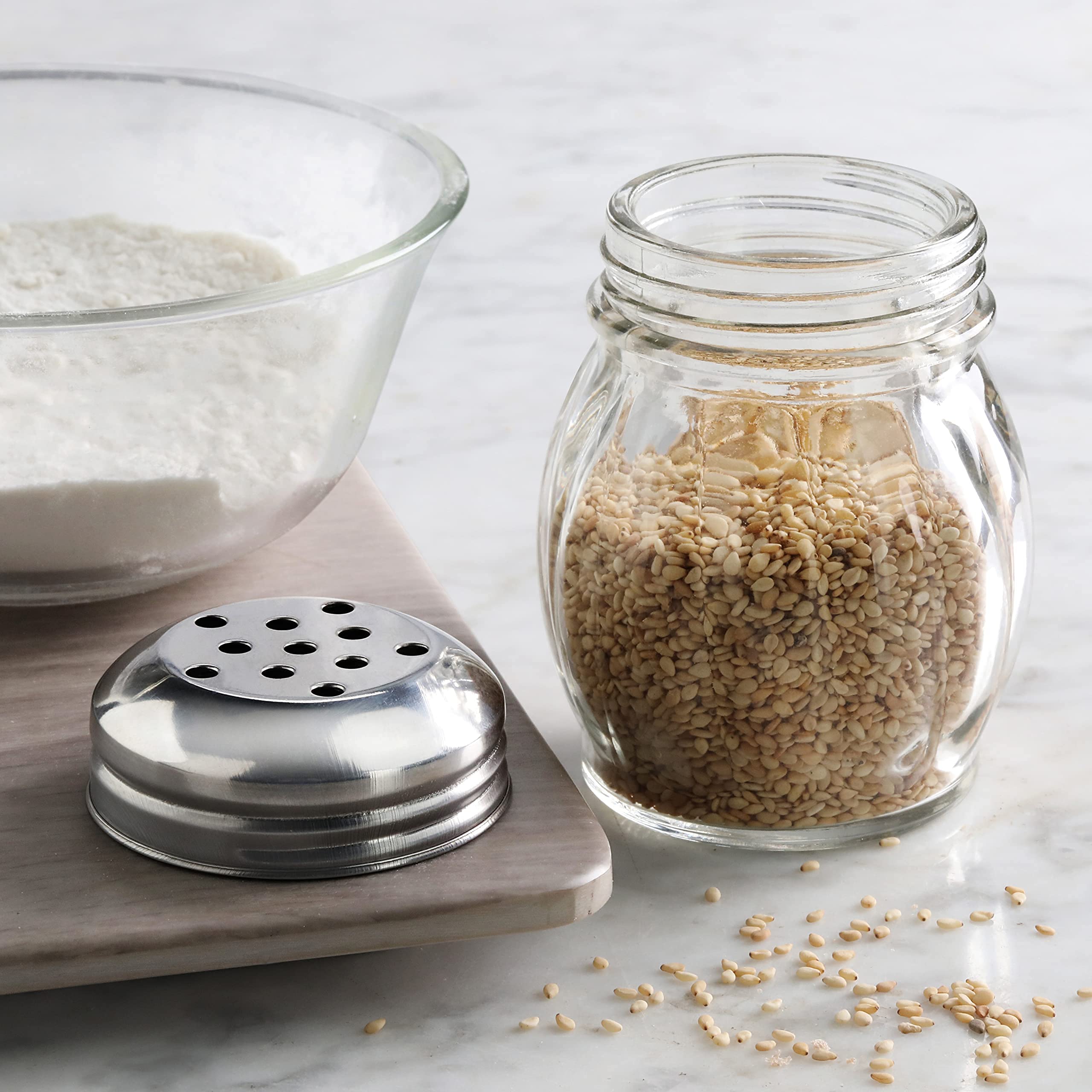 New Star Foodservice clear glass shaker shown on a tabletop display for guests.