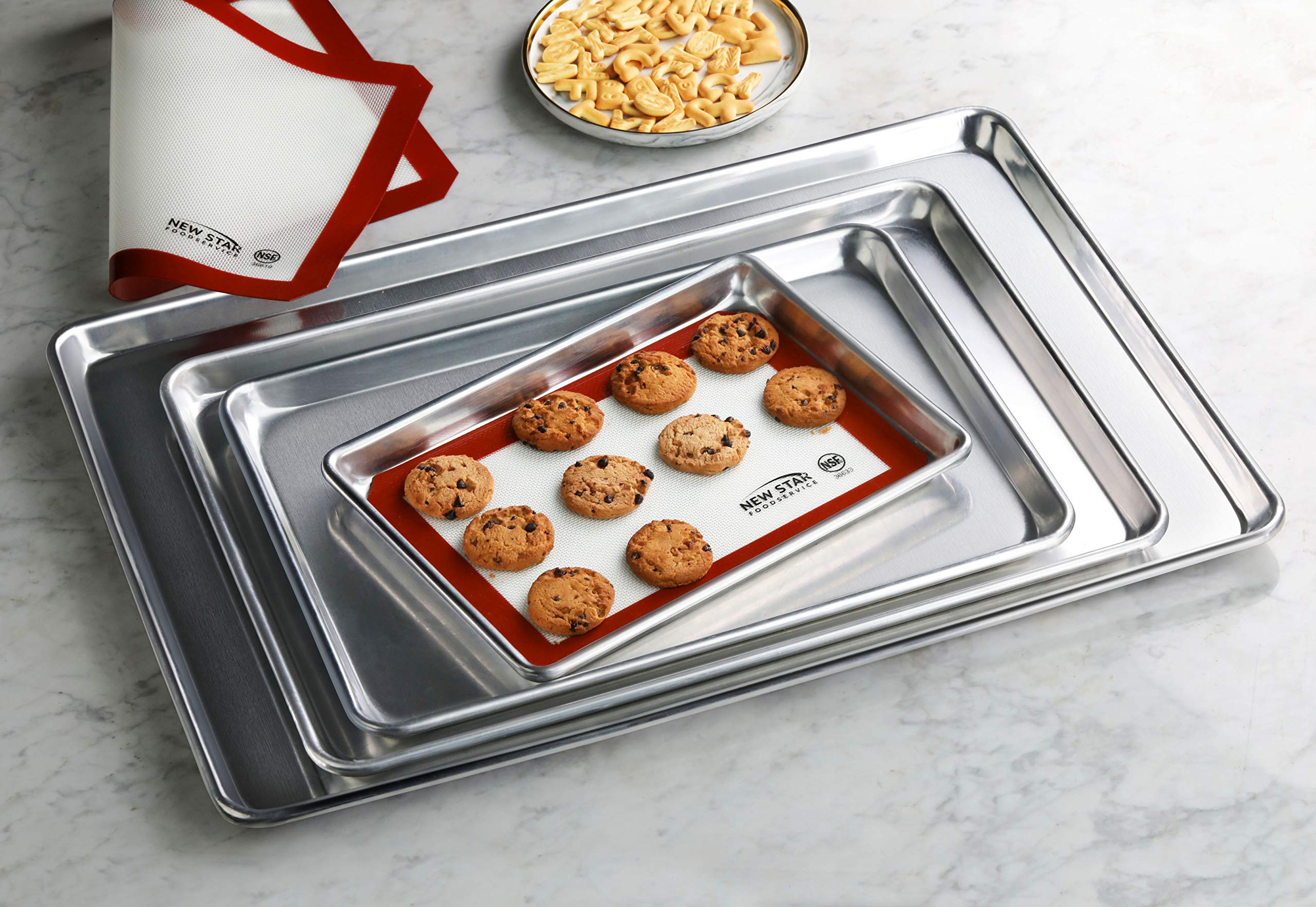 New Star aluminum sheet pan supports even heat for muffins and cookies.