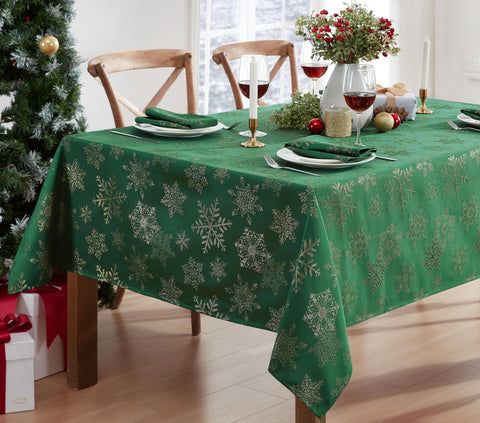 Newbridge fancy metallic snowflake tablecloth in hunter gold with festive shine for gatherings.