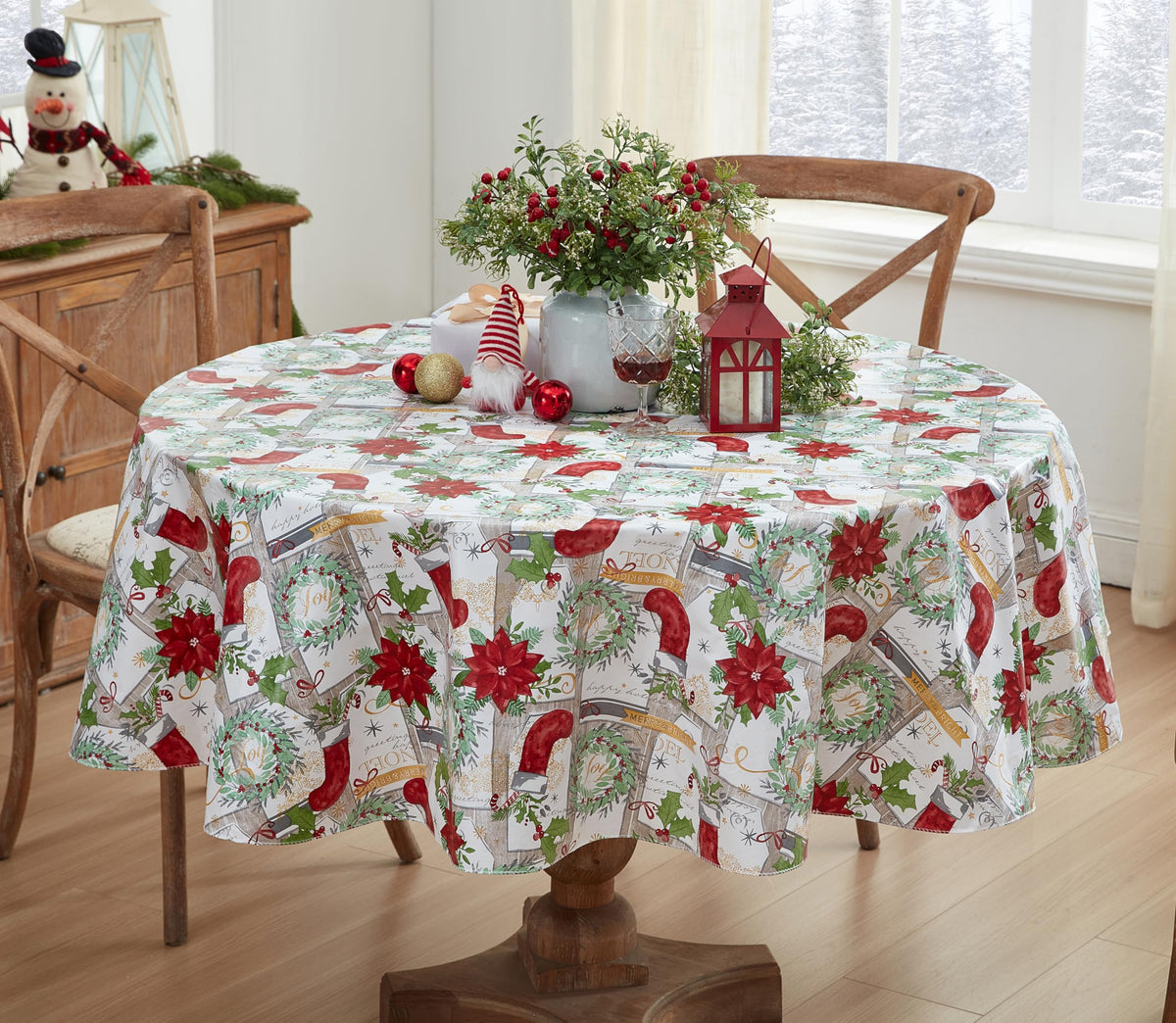 Newbridge Merry Christmas tablecloth with wreaths enhances festive dining and protects surfaces
