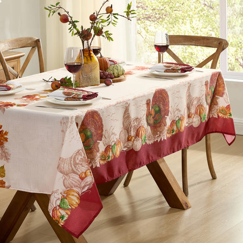 Newbridge Thanksgiving turkey border tablecloth with autumn harvest print, ideal for easy-care family meals.