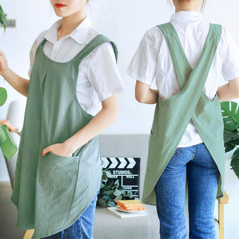 NEWGEM Japanese Linen Cross-Back Apron pockets in action for handy access