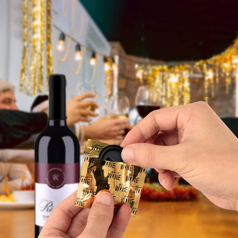 NEWKITCHEN portable wine stoppers tucked into a pocket for on-the-go use
