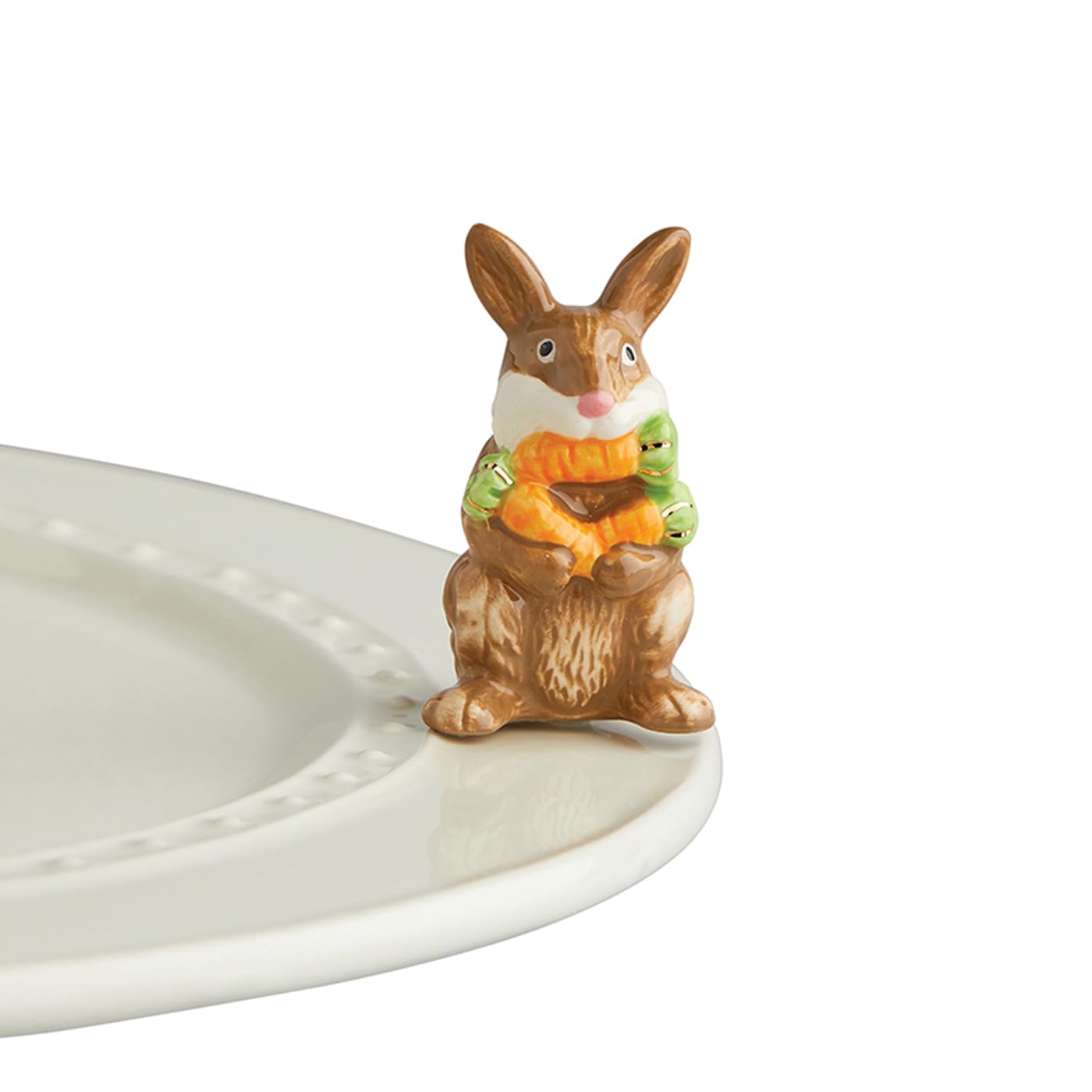 Nora Fleming Funny Bunny brown holding carrots, ideal Easter centerpiece.
