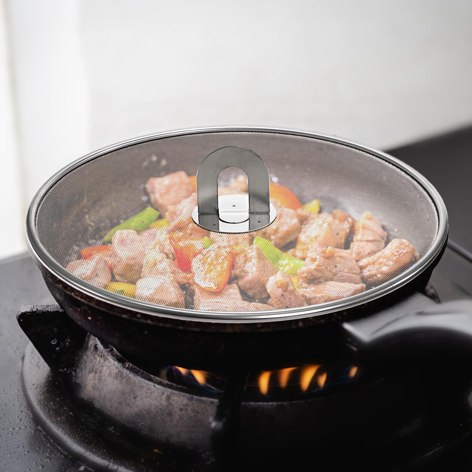 Nicunom splatter screen 13-inch on frying pan contains splatter and keeps walls clean