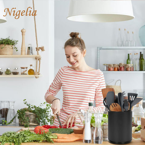 Nigelia countertop caddy with drainage layer keeps utensils dry.