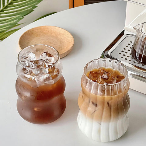 Nirvany ribbed glass cup 18oz with wave design, ideal for iced beverages and stylish presentations.