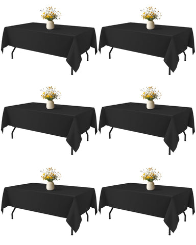 Niuara Black Rectangle Table Cloth draped for a wedding, creating a clean, elegant table setting.