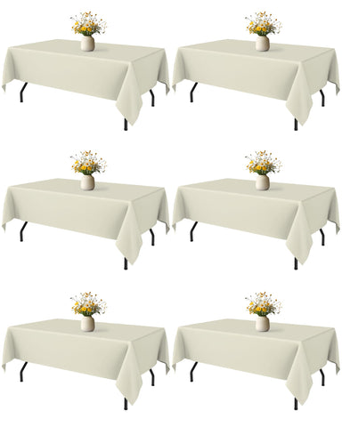 Niuara Ivory 60x84 rectangle tablecloth drapes elegantly on a 5ft table.