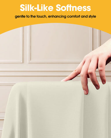 Niuara ivory rectangle tablecloth with wrinkle-resistant fabric for neat tables.