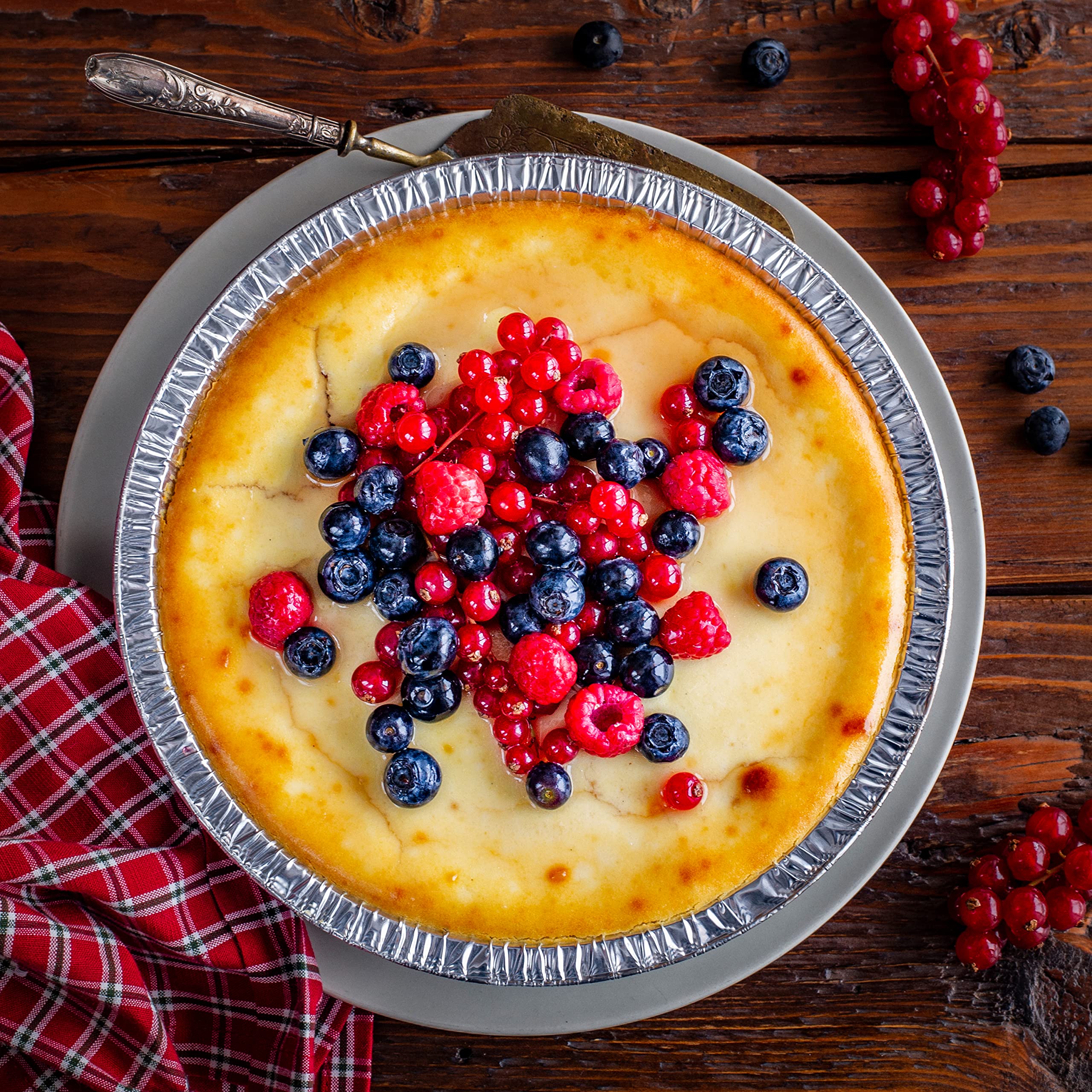 NoCry disposable pie pans stacked in packaging demonstrate mess-free single-use convenience.
