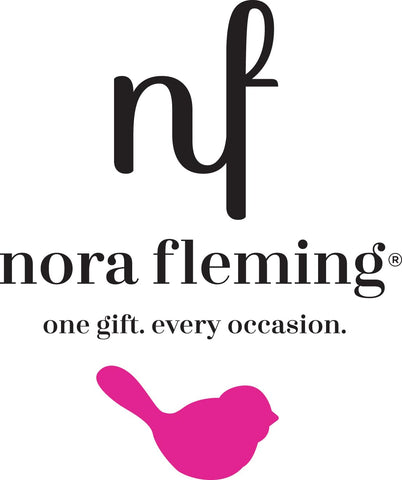 Nora Fleming interchangeable mini-base kit enables flexible seasonal displays.