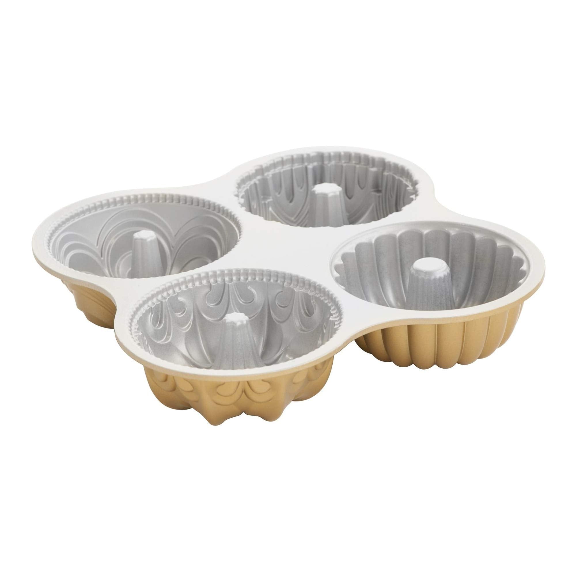 Nordic Ware Bundt Quartet Pan in gold, swirl design for stunning cakes.