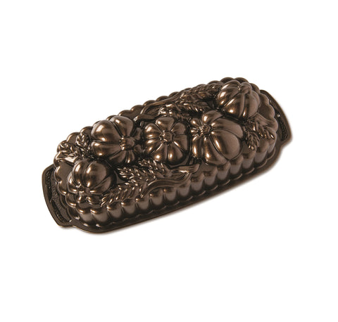 Nordic Ware 93448 wheat-pumpkin cast loaf pan offers a durable, even-baking surface.