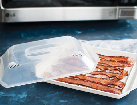 Nordic Ware bacon rack lid traps splatters for easier cleanup.