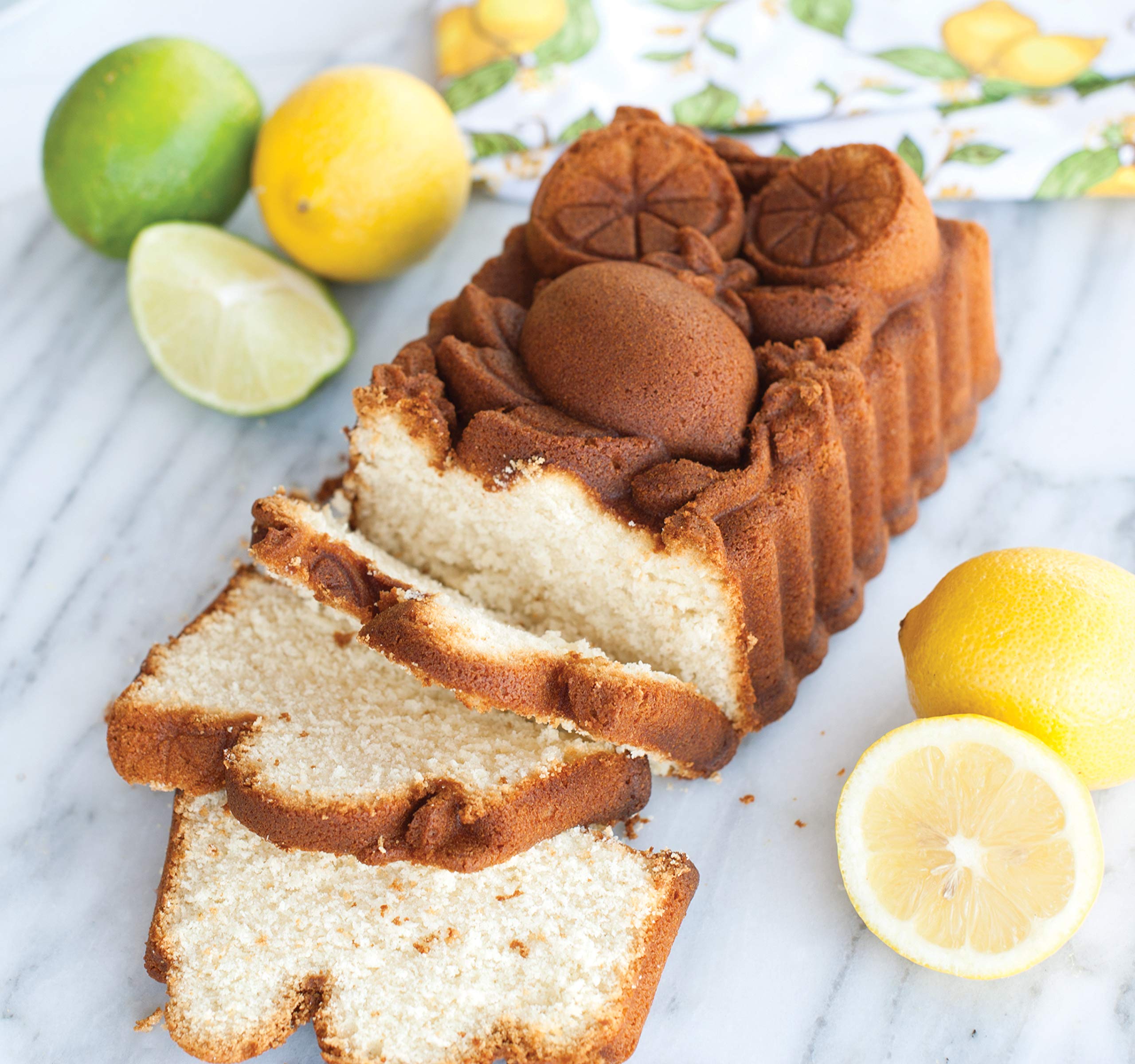 Nordic Ware Citrus Blossom cast aluminum close-up shows durable bakeware construction.