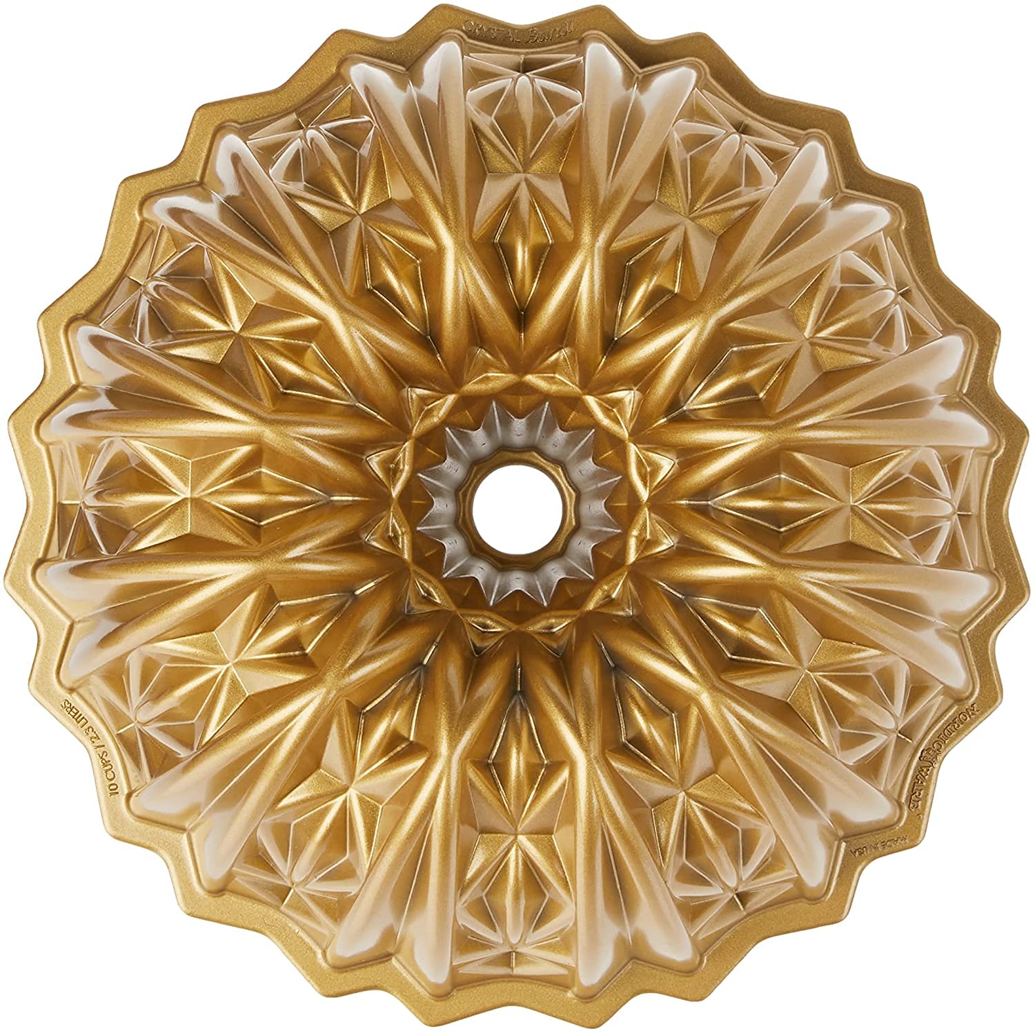 Nordic Ware Cut Crystal Bundt pan in gold with intricate swirl close-up