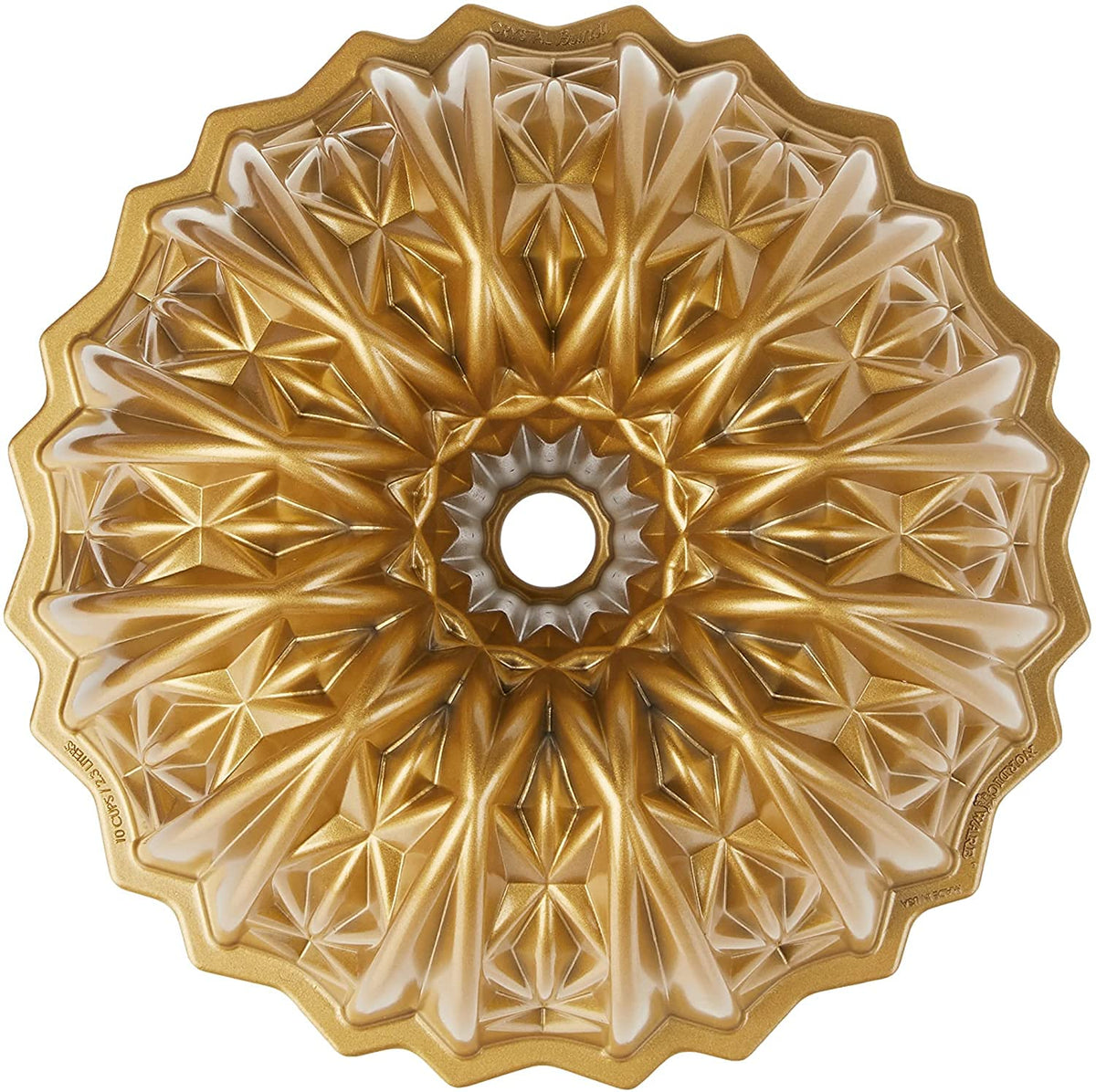 Nordic Ware Cut Crystal Bundt pan in gold with intricate swirl close-up
