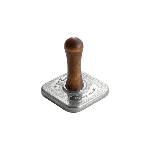 Nordic Ware holiday cookie embossing set for playful baking results.