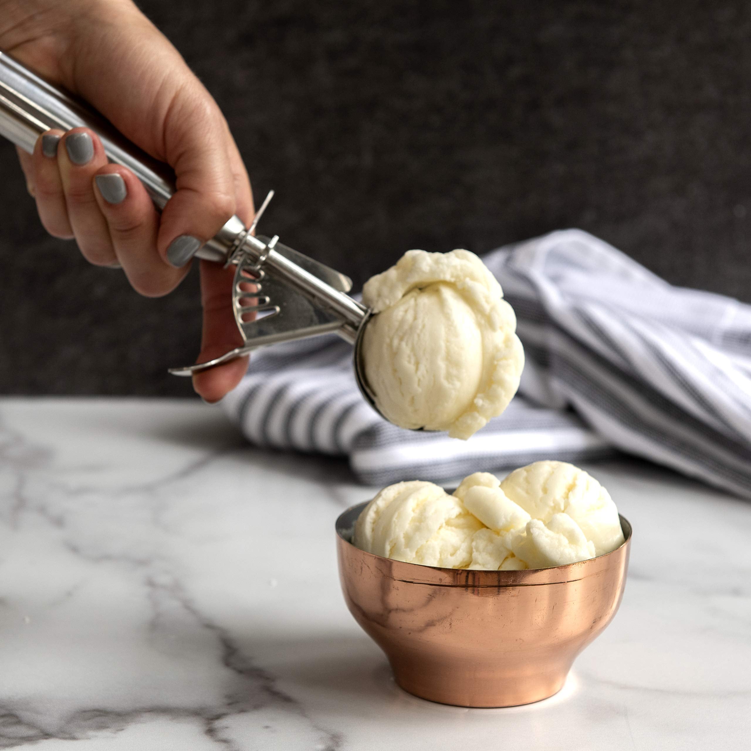 Nordic Ware large cookie scoop portioning muffins and cupcakes.