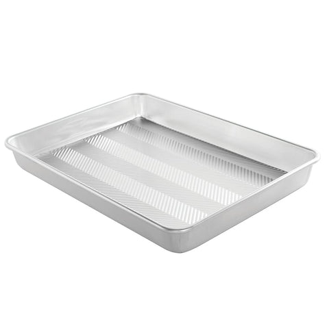 Nordic Ware Prism grid pan improves airflow for evenly crisp edges.