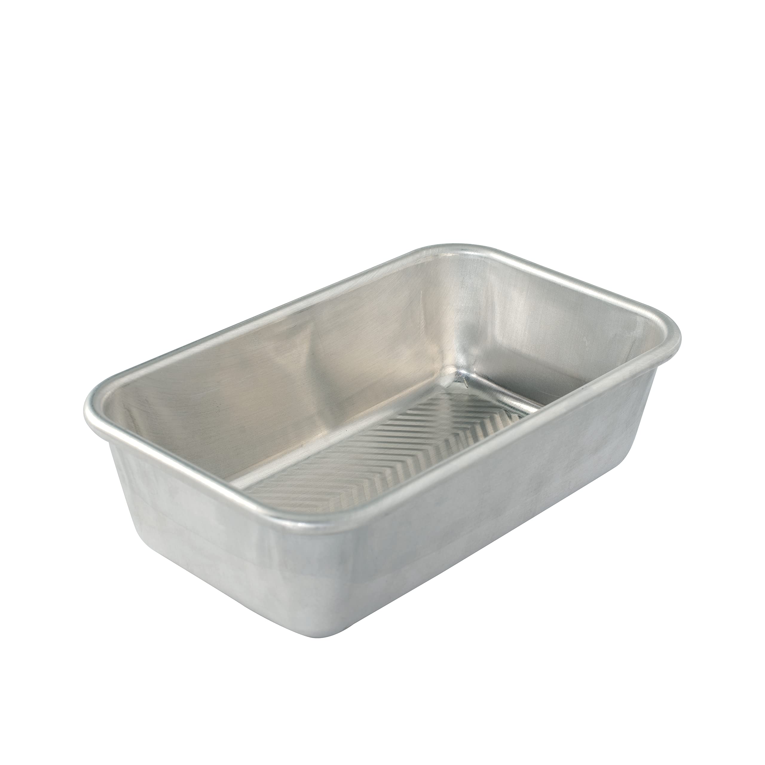 Nordic Ware Prism Loaf Pan with embossed grid for even browning.