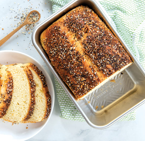 Nordic Ware Prism Loaf Pan requires hand washing for finish care.