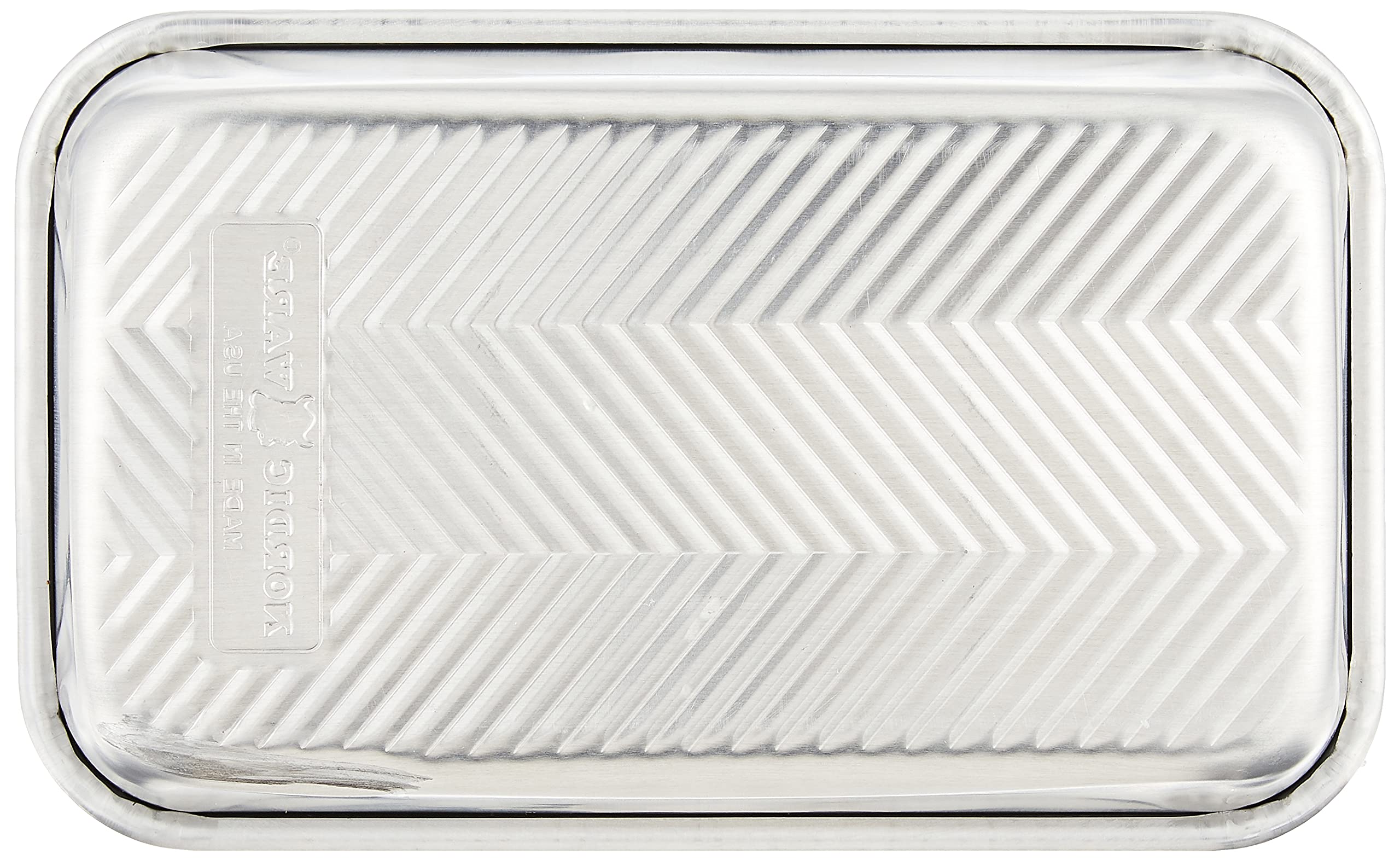 Nordic Ware Prism Loaf Pan natural aluminum for even heat distribution.