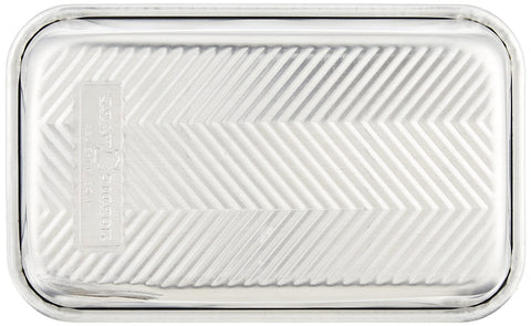 Nordic Ware Prism Loaf Pan natural aluminum for even heat distribution.