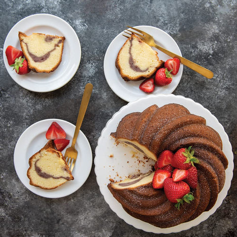 Nordic Ware Swirl Bundt Pan gold, even browning with cast aluminum surface.