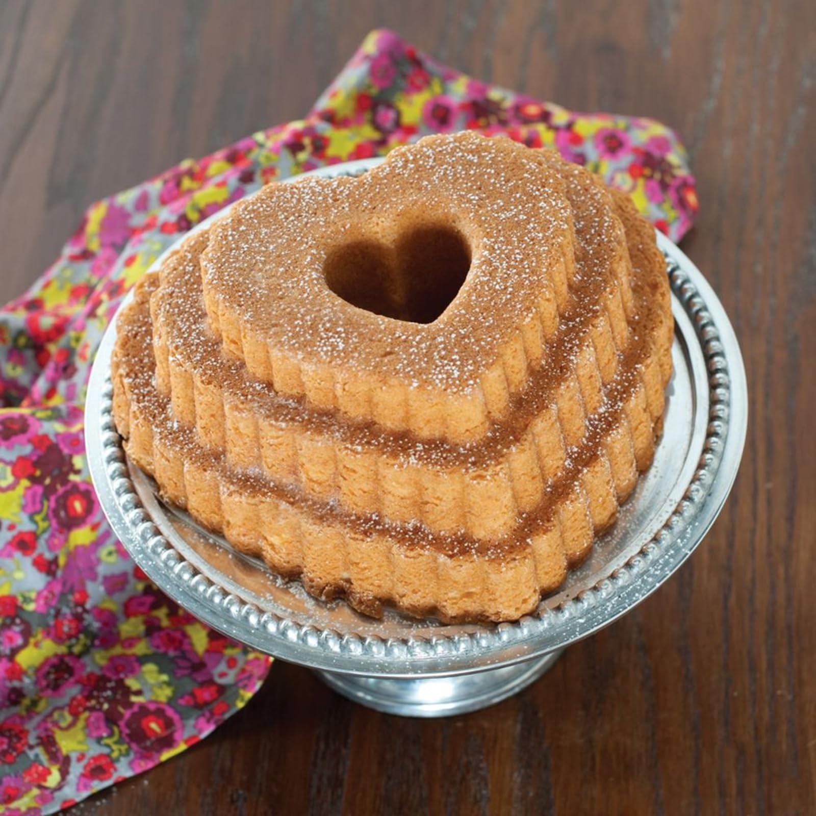 Nordic Wear Tiered Heart Bundt in-use demonstrates even browning and easy release.