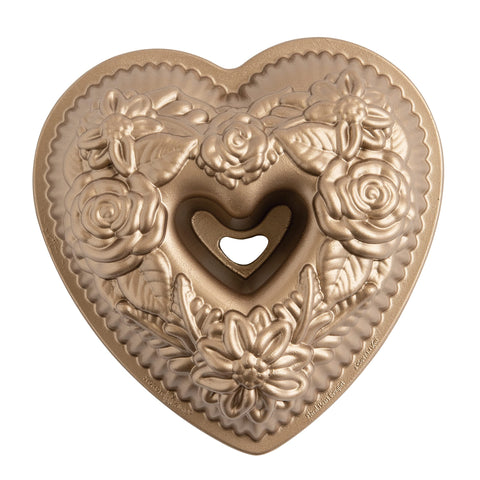 Nordic Ware Wildflower Heart Bundt pan with floral design for even browning.