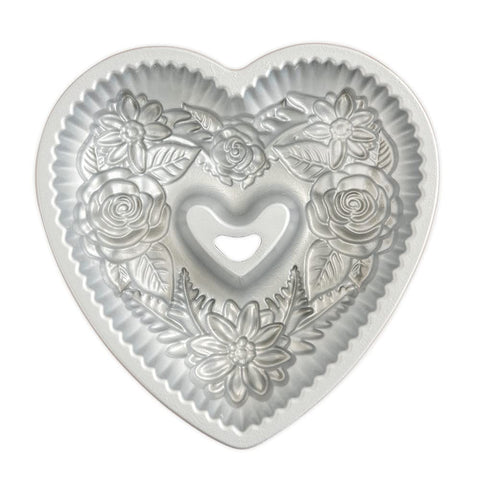 Nordic Ware Wildflower Heart Bundt pan supports even heat distribution for consistent textures.