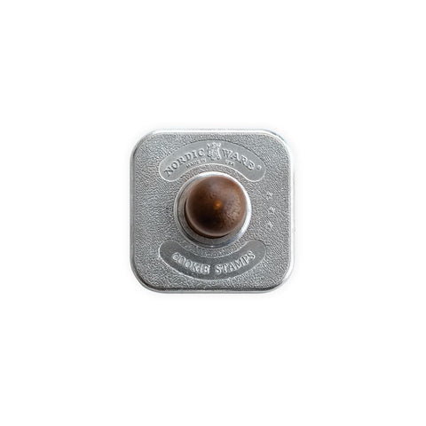 Nordic Ware wooden handle stamps ensure steady stamping with dough.