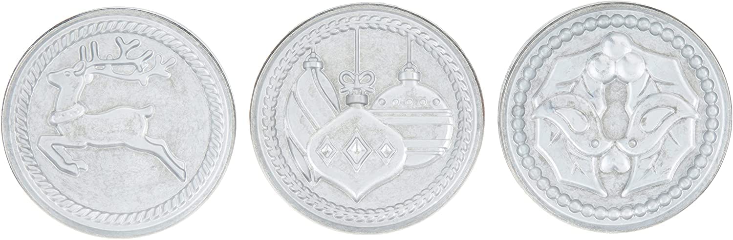 Nordic Ware Yuletide cookie stamps with wooden handles for easy, secure pressing.