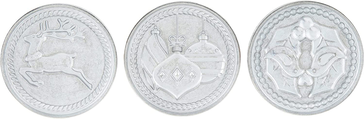 Nordic Ware Yuletide cookie stamps with wooden handles for easy, secure pressing.