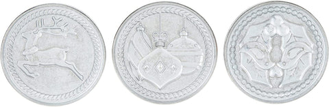 Nordic Ware Yuletide cookie stamps with wooden handles for easy, secure pressing.