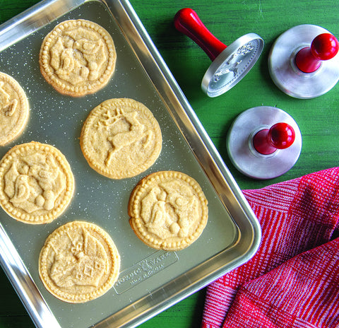 Nordic Ware Yuletide stamps perform best when dough is lightly dusted with flour.