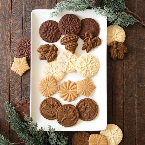 Nordic Ware Yuletide stamps feature wooden handles for secure grip.