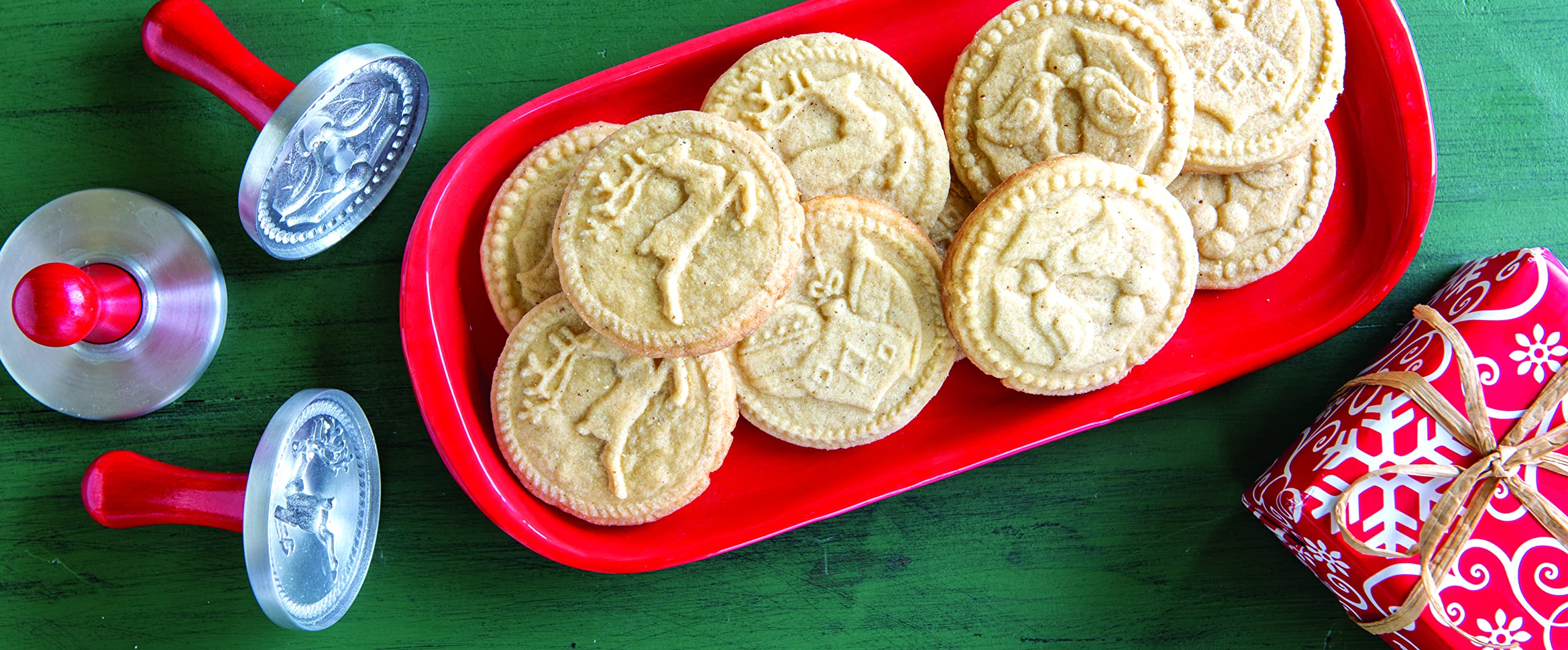 With Nordic Ware Yuletide stamps, roll dough into balls for uniform impressions.