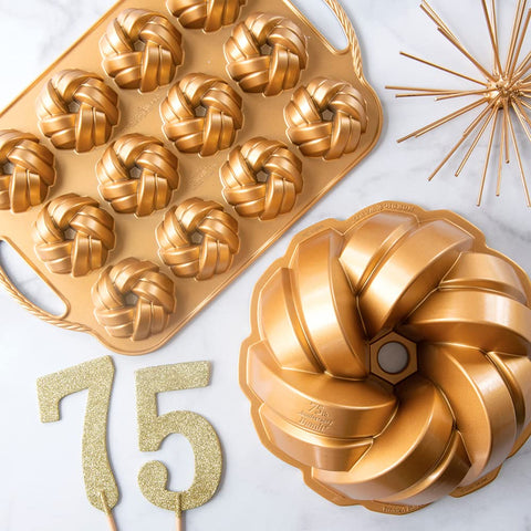 Nordic Ware 95377 Bundtlette Pan gold cooling trays with bites.
