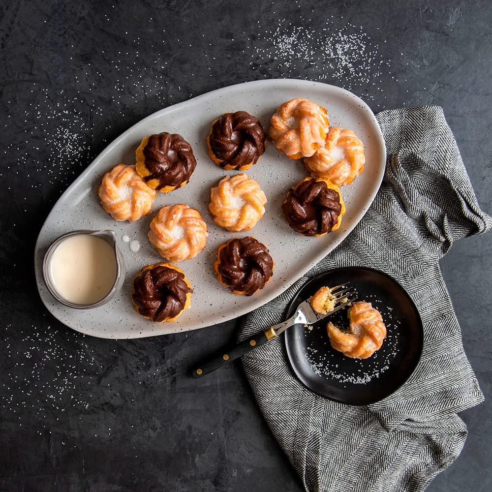 Nordic Ware 95377 Bundtlette Pan gold in use with mini bundt bites.