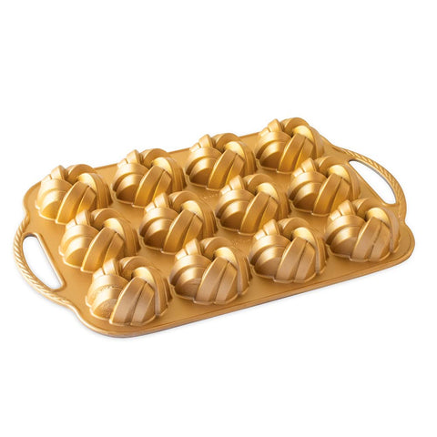 Nordic Ware 95377 Bundtlette Pan gold side view shows even browning and detail.