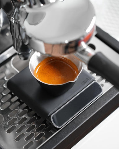 Normcore ergonomic cup improves grip during espresso shots