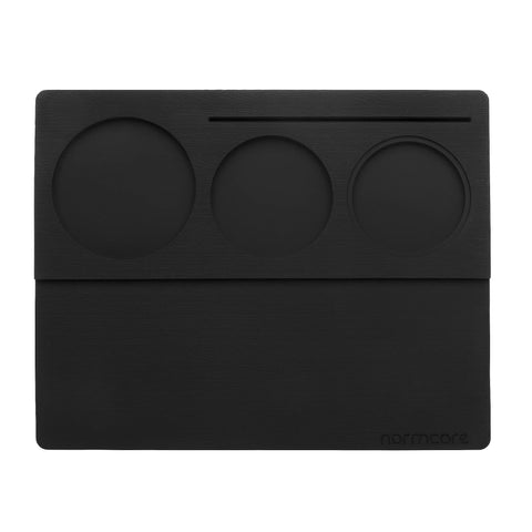 Normcore espresso tamping mat top view; stable anti-slip surface aids precise tamping.