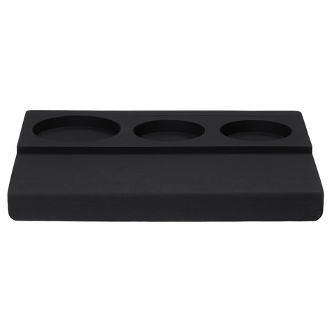 Normcore silicone surface stabilizes your portafilter for even tamping.