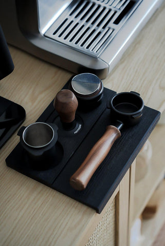 Normcore V3 mat includes dedicated slots for tamper, puck screens, and tools.
