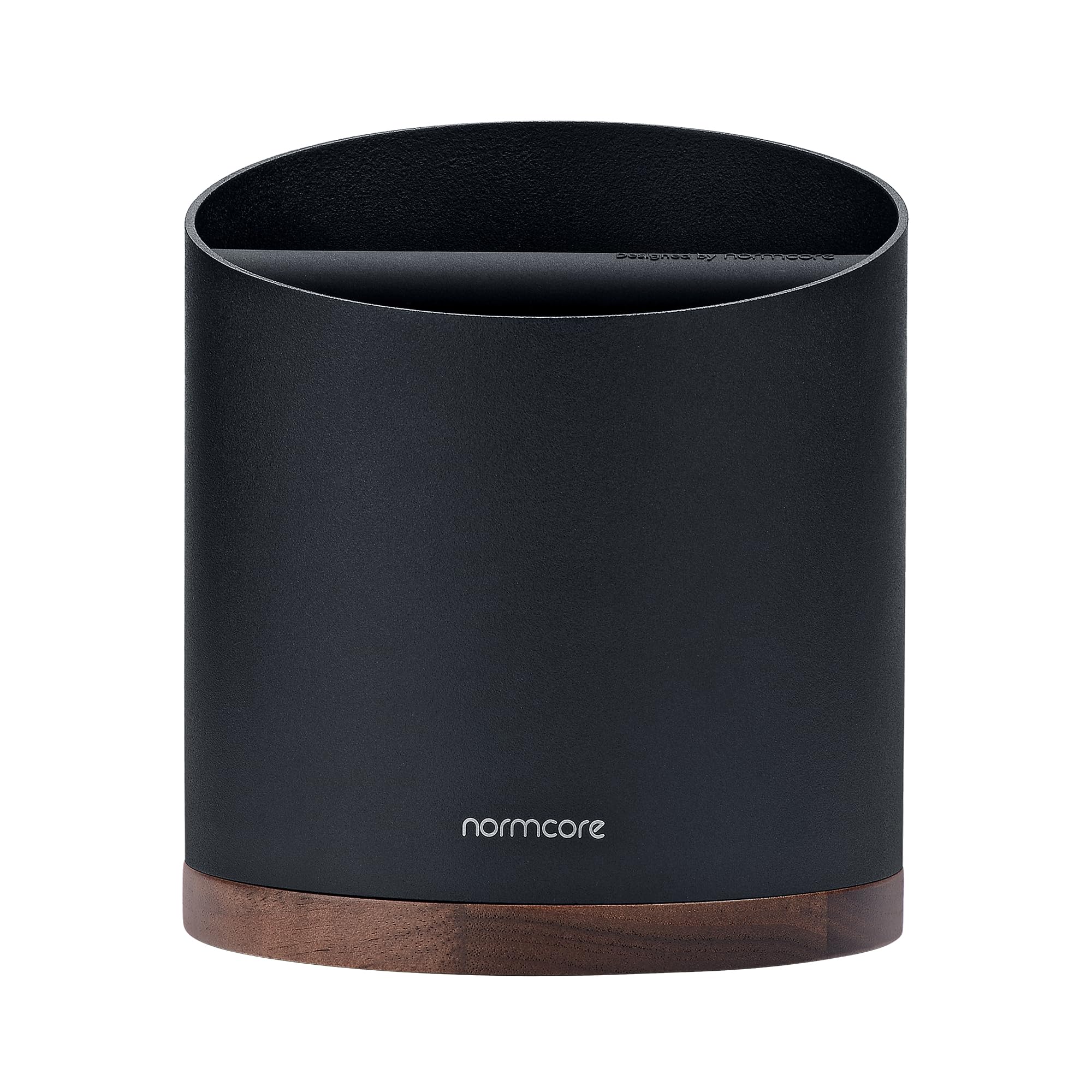Normcore knock box interior angled to minimize splatter and keep counters clean.